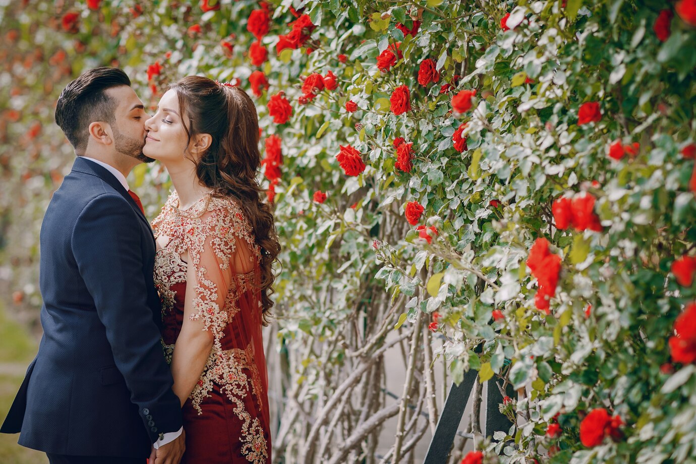 beautiful-woman-long-red-dress-walks-around-city-with-her-husband_1157-13377