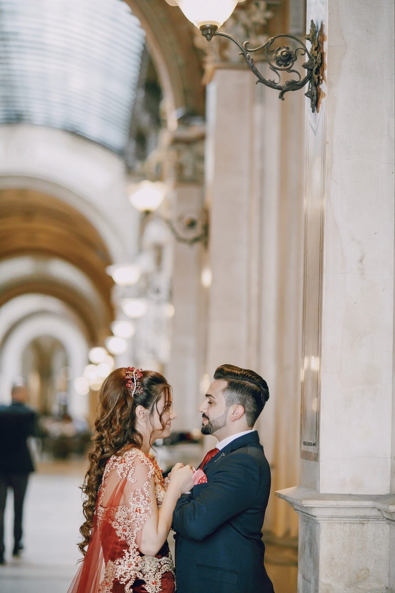 beautiful-woman-long-red-dress-walks-around-city-with-her-husband_1157-13393